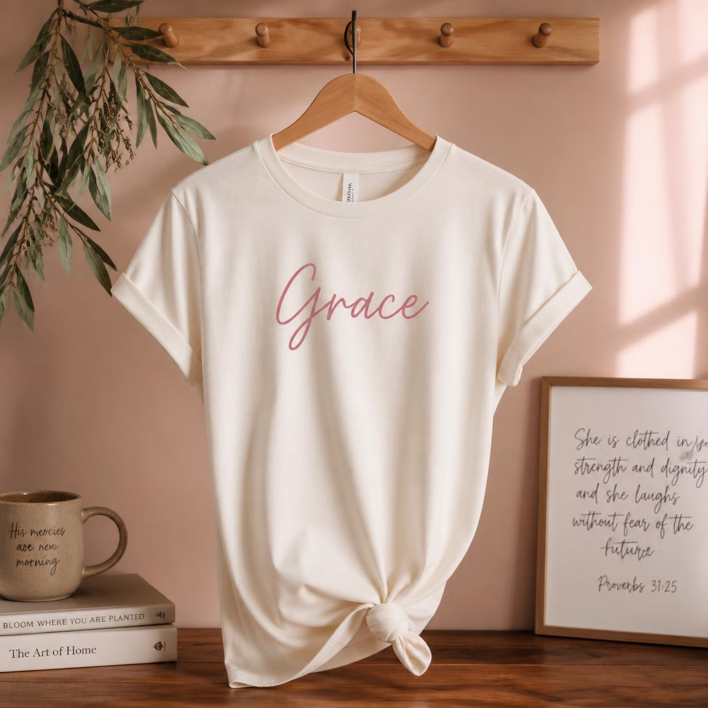 Cream Grace script t-shirt on wooden hanger